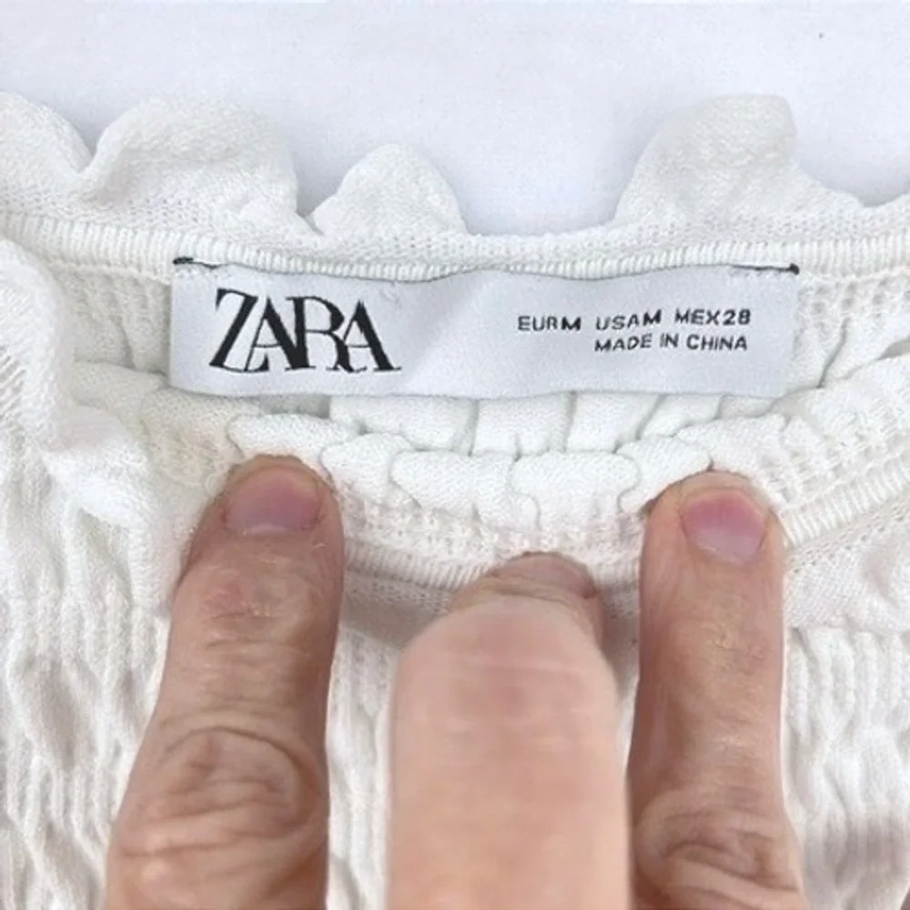 Zara smocked off